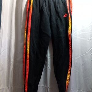 Black Track Pants with Orange and Yellow Stripes
